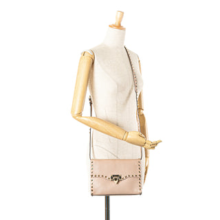 Valentino Medium Pebbled Calfskin Rockstud Flip Lock Crossbody