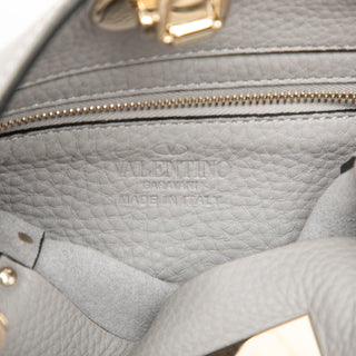 Valentino Mini Pebbled Calfskin Rockstud Flip Lock Messenger Bag