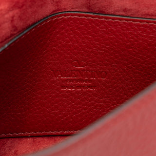 Valentino Medium Pebbled Calfskin Rockstud Flip Lock Crossbody