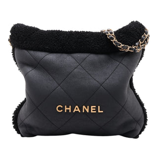 Chanel Small Quilted Aged Lambskin and Shearling 22 Handbag