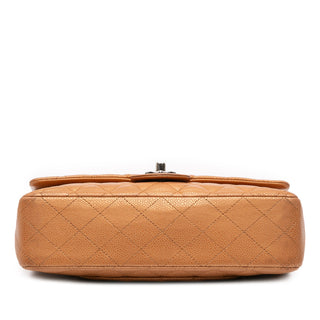 Chanel
Medium Classic Metallic Caviar Double Flap