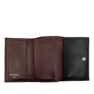 Chanel
CC Quilted Caviar Flap Trifold Wallet