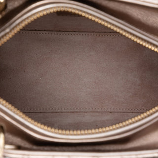 Dior
Medium Metallic Lambskin Cannage Lady Dior