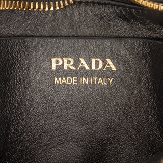 Prada
Small Re Nylon and Leather Arque Satchel