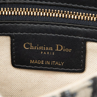 Dior
Oblique Canvas Saddle Bag