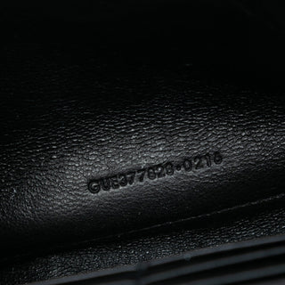 Saint Laurent
Metallic Chevron Monogram Chain Wallet