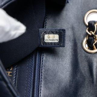 Chanel
Mini Quilted Lambskin Mademoiselle Chic Flap