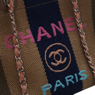 Chanel
Medium Raffia Striped Deauville Tote