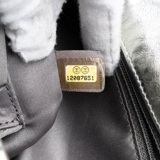 Chanel
Metallic Glazed Calfskin Perforated Rodeo Drive Flap