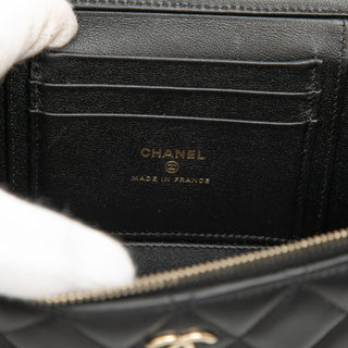 Chanel
Small Lambskin Top Handle Vanity Case with Chain