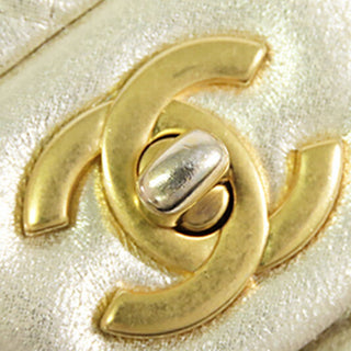 Chanel
Mini Rectangular Classic Metallic Lambskin Single Flap