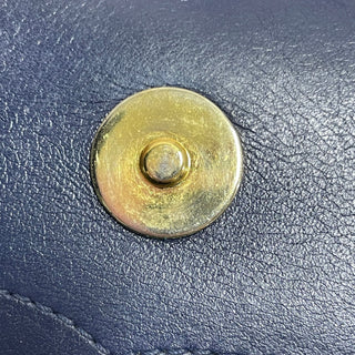 Chanel
Small Bicolor Caviar CC Filigree Flap