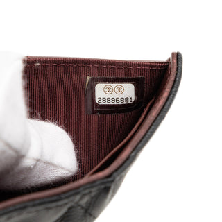 Chanel
CC Quilted Caviar Flap Trifold Wallet