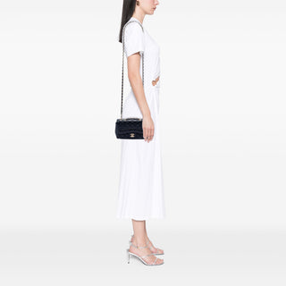 Chanel
Mini Quilted Lambskin Mademoiselle Chic Flap