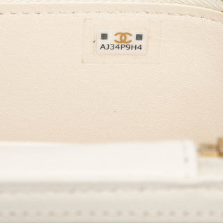 Chanel
Small Quilted Lambskin Vanity Case with Chain