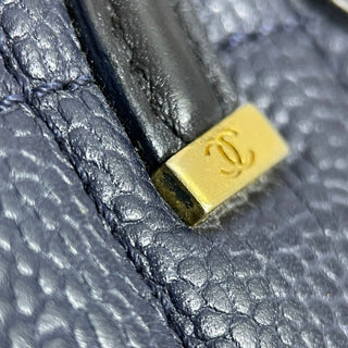 Chanel
Small Bicolor Caviar CC Filigree Flap