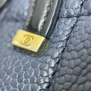 Chanel
Small Bicolor Caviar CC Filigree Flap